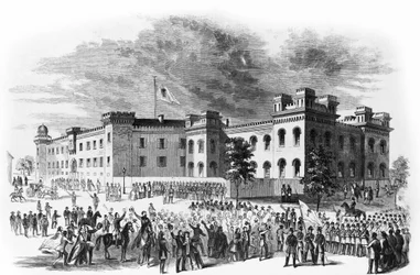 A dél-karolinai állam arzenálja Charlestonban, Dél-Karolinában, a Washington Light Infantry felvonuló egységei őrzik, 1860